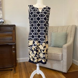 R&K sleeveless navy dress with yellow and white embroidery
